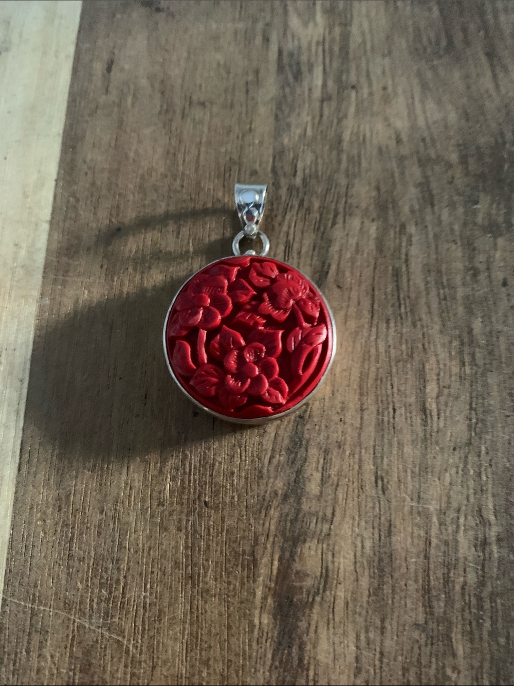Sterling Cinnabar Floral Carved Round Pendant